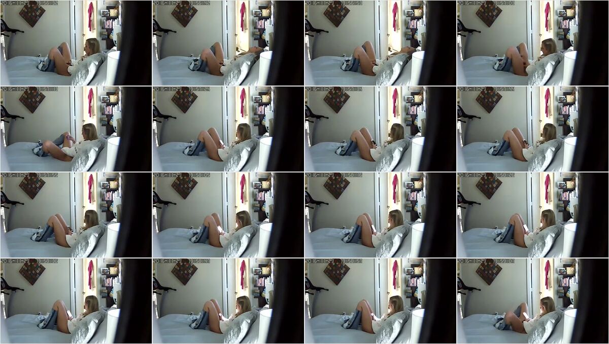 Blonde girl masturbating with dildo on the bed  Hidden cam